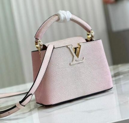 Louis Vuitton Capucines bag in a Jasmine Pink.