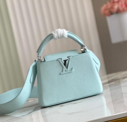 Louis Vuitton Capucines bag in a Turquoise or Light Blue.