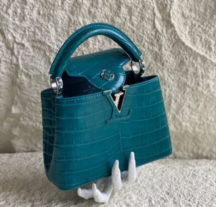 Louis Vuitton Capucines - In a Aquamarine crocodile with gold tone hardware