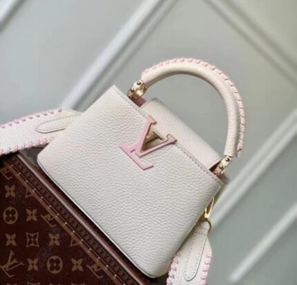 Louis Vuitton Capucines Mini in Marshmallow Pink.