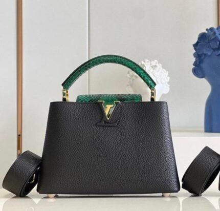 Louis Vuitton Capucines BB handbag, specifically in a black color with a deep green top handle