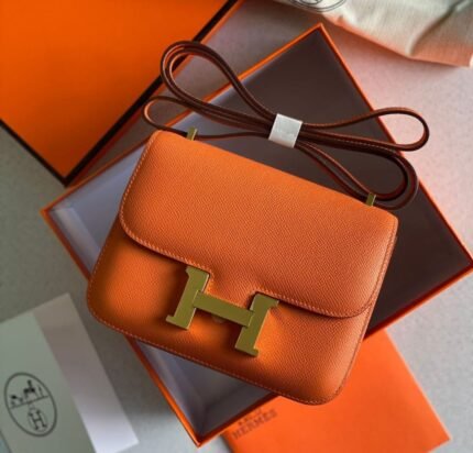 Hermès Constance in Orange H Swift – Where Heritage Meets Bold Glamour