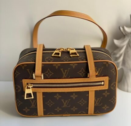 Louis Vuitton Cité Shoulder Bag - Brown